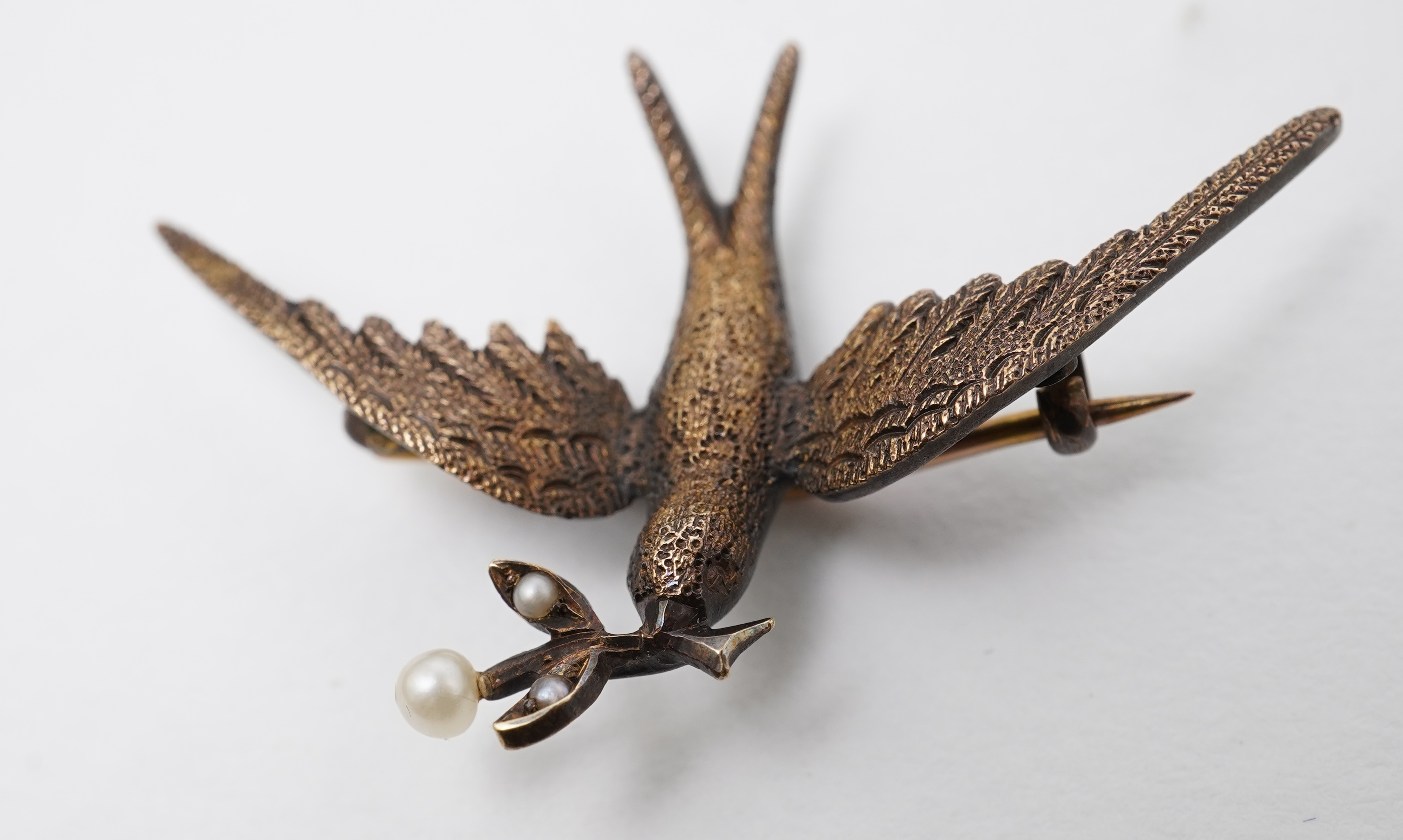 An Edwardian gold and seed pearl brooch, early 20th century